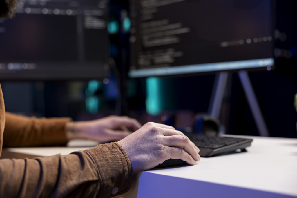 freelancing cybersecurity admin using computer to prevent cyber attacks